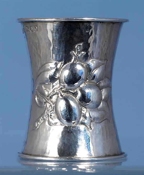 An Edwardian Arts & Crafts planished silver waisted napkin ring, by Omar Ramsden & Alwyn Carr, Height 55mm weight 1oz/33grms